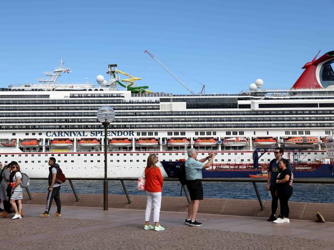 SYDNEY, AUSTRALIA - NewsWire Photos OCTOBER 27, 2022: People out in rare Sunny weather at Circular Quay with the cruise ship Carnival Splendor in Port.Picture: NCA NewsWire / Damian Shaw