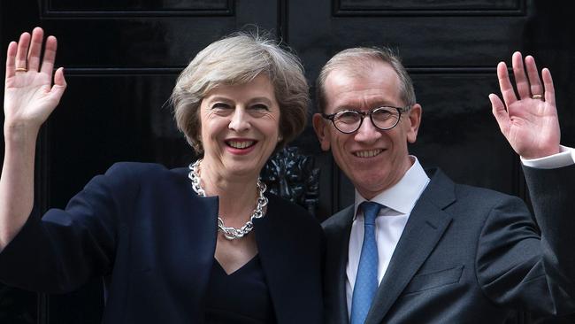 Theresa May enters No 10 for the first time as prime minister with her husband in 2016. Picture: AFP Photo/Justin Tallis