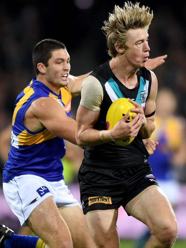 Marshall marks in front of Tom Barrass during the elimination final. Picture: Mark Brake/AFL Media/Getty Images