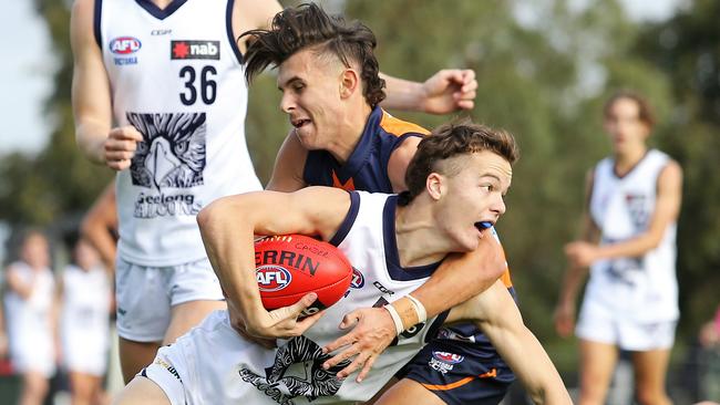 Sam Ramsay tackles Keidan Rayner. Picture: Martin Keep