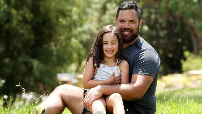 Kaylen Brown, pictured with his daughter Maia, 6, hopes the “homework grid” method will be picked up. Picture: Tim Hunter