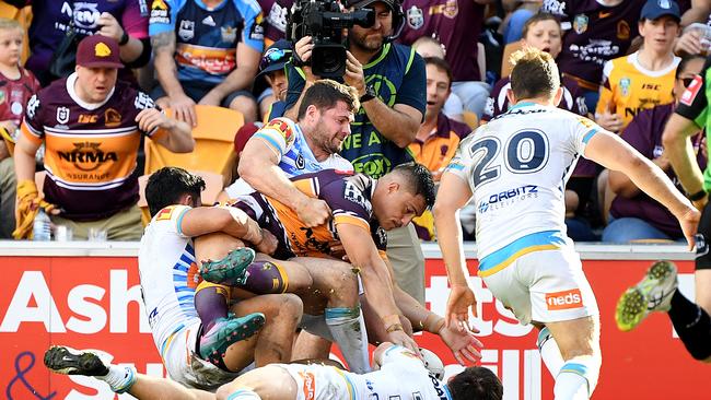 The crowd was up and about at Suncorp Stadium. Picture: AAP Image/Dave Hunt