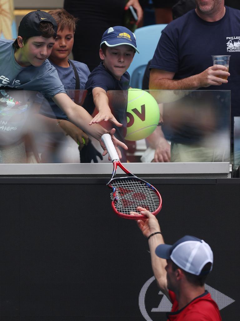 And then became a souvenir for a young fan. (Photo by Julian Finney/Getty Images)