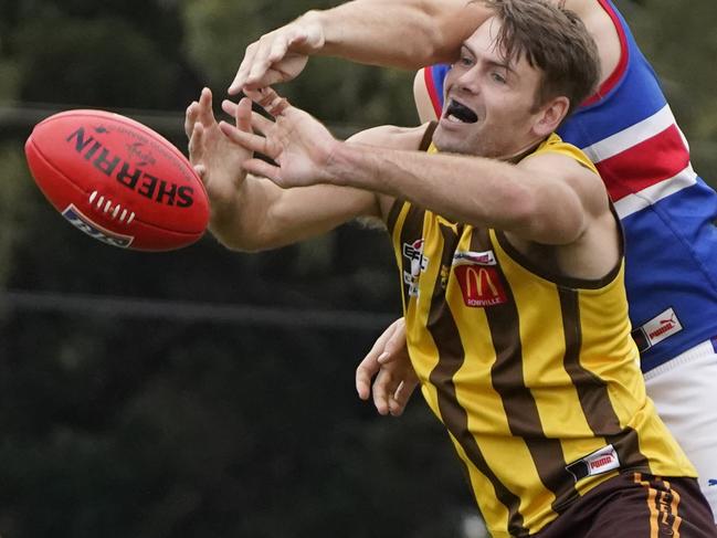 EFL Premier Division 2022: Rowville v South Croydon at Seebeck Oval.  Nikolas Schoenmakers (Rowville) and  Max King (South Croydon). Picture: Valeriu Campan