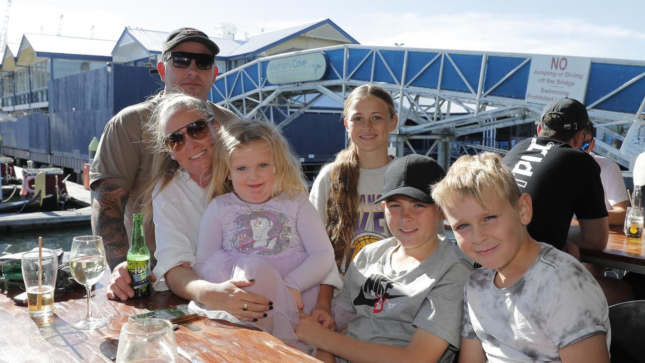 <p>Steve Jolly and Allison Jolly with children Ava,13, Cruz, 11, Cooper, 9, and Cali, 3, at the Fishermans Wharf, which is closing down today, Sunday, June 25, 2028. Photo: Regi Varghese</p>