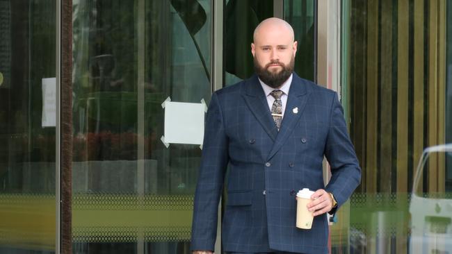 Bradley Payne-Moore leaves the ACT Supreme Court after a sentencing hearing. He has pleaded guilty to online child abuse offences. Picture: Craig Dunlop