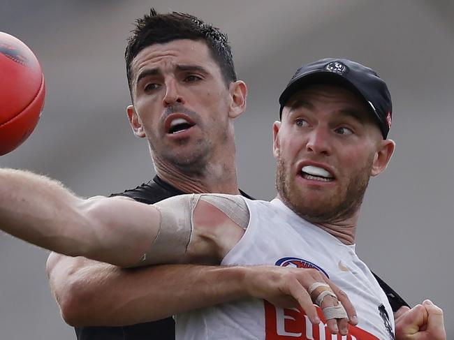 MELBOURNE , AUSTRALIA. March 7 , 2024.  AFL . Collingwood training at Olympic Park.    Tom Mitchell and Scott Pendlebury battle during todays session at Olympic Park       . Pic: Michael Klein