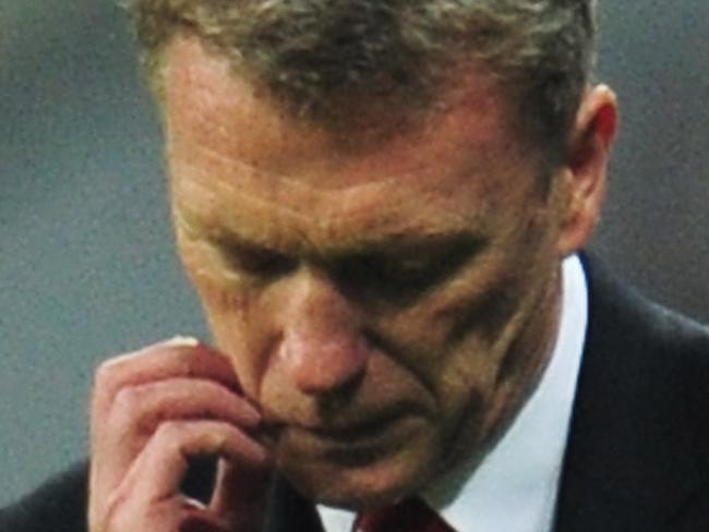 MUNICH, GERMANY - APRIL 09: David Moyes, manager of Manchester United looks dejected during the UEFA Champions League Quarter Final second leg match between FC Bayern Muenchen and Manchester United at Allianz Arena on April 9, 2014 in Munich, Germany. (Photo by Shaun Botterill/Getty Images)