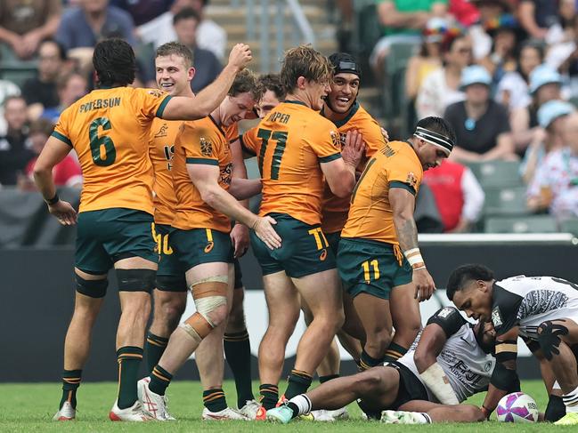 Australia celebrates during the clash with Fiji. Picture: World Rugby/Mike Lee