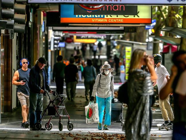 Quiet Melbourne, emtpy streets, shoppers in masks etc. Swanston Street. Pictures: Tim Carrafa