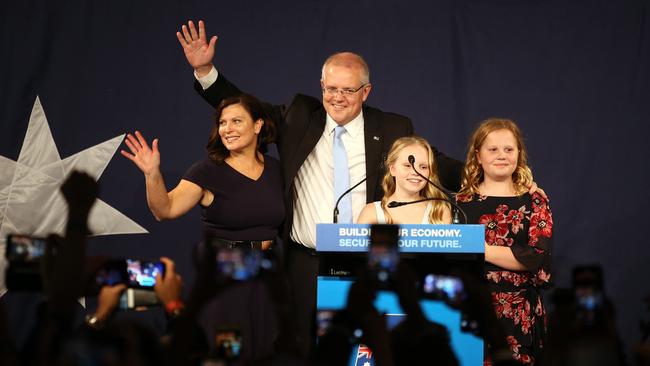 Scott Morrison addressing the Liberal Party faithful in Sydney on Saturday night with his wife and children by his side. Picture: Sam Ruttyn