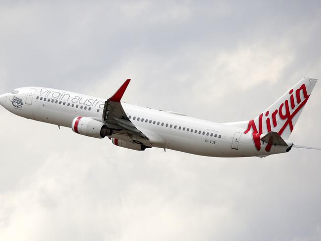 SYDNEY, AUSTRALIA - NewsWire Photos OCTOBER 08, 2020 - A Virgin Australia plane takes off at Sydney Airport on Thursday October 08, 2020.Picture: NCA NewsWire / Christian Gilles