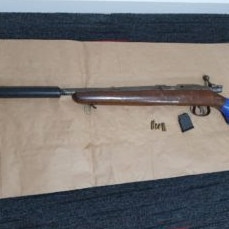 Rifles, handguns and batons were seized.