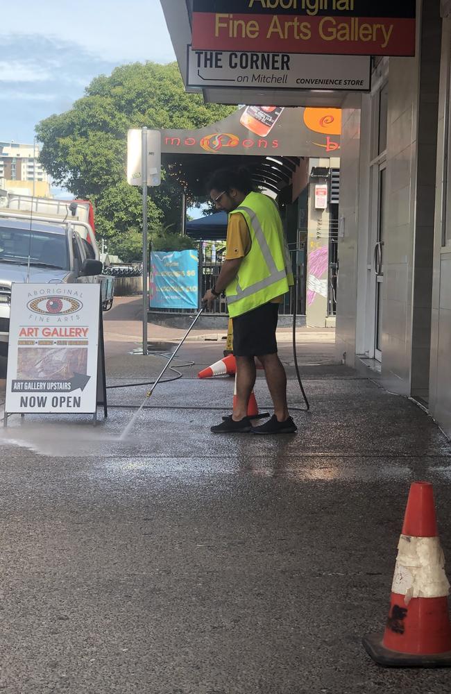 Crime scene clean-up crews cleared away blood splatters on Mitchell St and Knuckey St following an alleged fatal brawl on Tuesday, December 20. Picture: Sierra Haigh