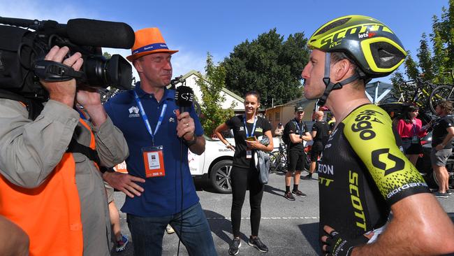 Former professional cyclist Jens Voigt talks to Brit Simon Yates during stage two of the Tour Down Under. Picture: Tim de Waele/Getty Images.