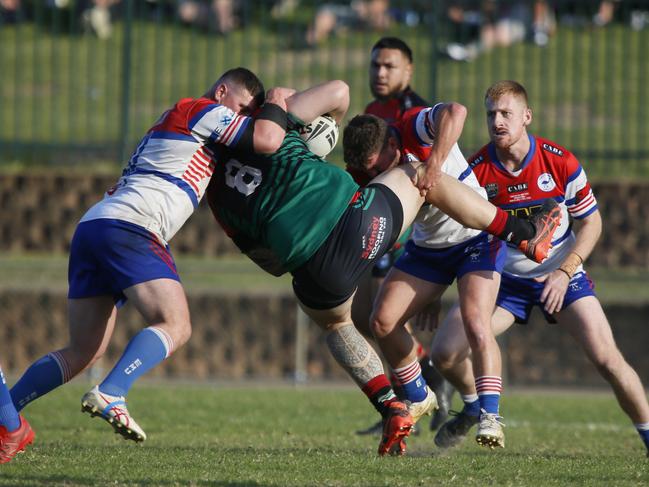 Leslie Kini is tackled for Colyton. Picture Warren Gannon Photography