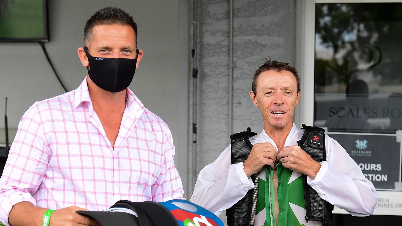 Paul Shailer at Eagle Farm, with jockey Michael Cahill on Wednesday, March 31 2021. Picture: Grant Peters/Trackside Photography