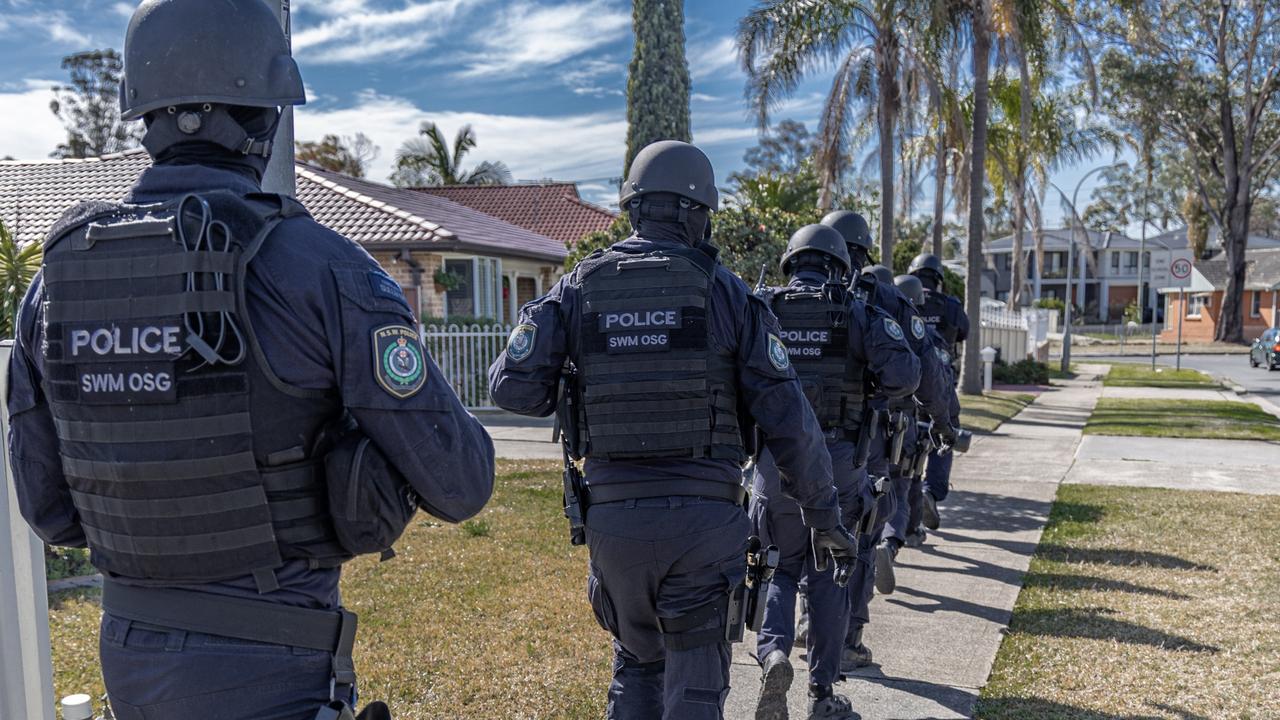 Two men charged over Lidcombe home invasion | Herald Sun