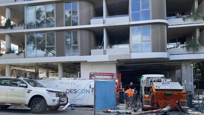 Some subbies were removing equipment and supplies, while other kept working, at the site of Waverley Residences in Southport, the day its builder Descon Group Australia went into liquidation.