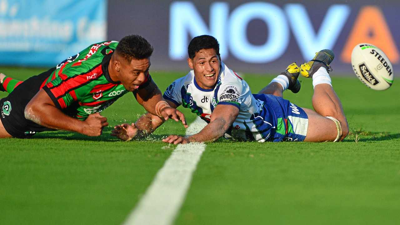 NRL action at Sunshine Coast Stadium between New Zealand Warriors and the South Sydney Rabbitohs. Junior Tatola and Roger Tuivasa-Sheck. Picture: John McCutcheon