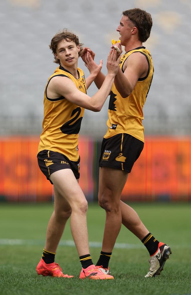 Cody Angove and Bo Allan of Western Australia celebrate a goal during Western Australia’s clash with Vic Metro at Optus Stadium. Picture: Paul Kane/AFL Photos/via Getty Images.