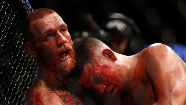 Conor McGregor (L) beat Nate Diaz (R) in an epic battle at UFC 202.