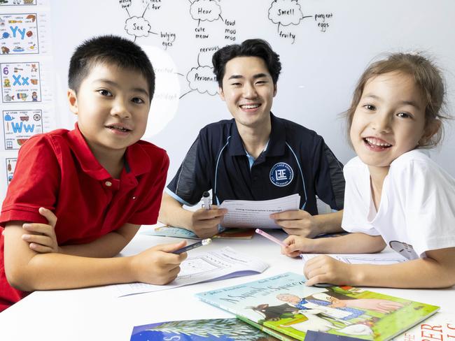 HOLDING FOR THE COURIER MAIL -  Tutor E-Yong Lee from Lee Excellence Education Academy with students Owen Gu and Emily Paterson, Saturday, January 4, 2025 - Picture: Richard Walker