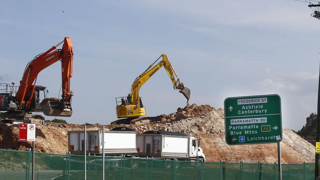 Viewed from Wattle St, the area bound by Walker Ave, Parramatta Rd, Wattle St and Allum St Haberfield, where houses have been demolished and WestConnex construction is under way. Picture: John Appleyard