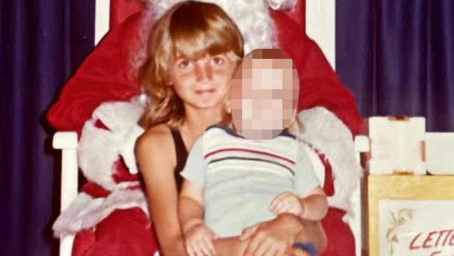 Sonia Lee, the secret daughter fathered by murder suspect Jon Winfield in Christmas photo with Santa in 1981.