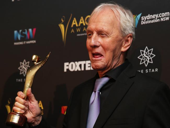 Paul Hogan poses in the media room after winning the AACTA Longford Lyell Award. Picture: Caroline McCredie/Getty