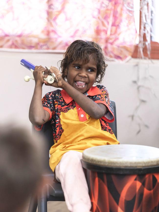 A Yipirinya School student participating in a drumming program. Picture: Nico Liengme