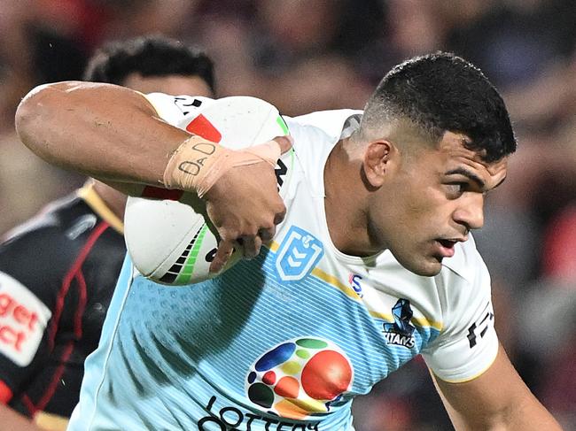 BRISBANE, AUSTRALIA - FEBRUARY 22: David Fifita of the Titans attempts to break free from the defence during the 2025 NRL Pre-Season Challenge match between Dolphins and Gold Coast Titans at Kayo Stadium on February 22, 2025 in Brisbane, Australia. (Photo by Bradley Kanaris/Getty Images)