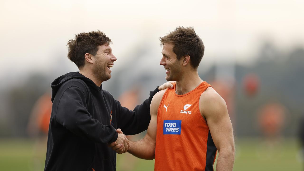 Giants co-captain Toby Greene congratulates Matt de Boer after he anounced his retirement from the AFL. Picture: Phil Hillyard