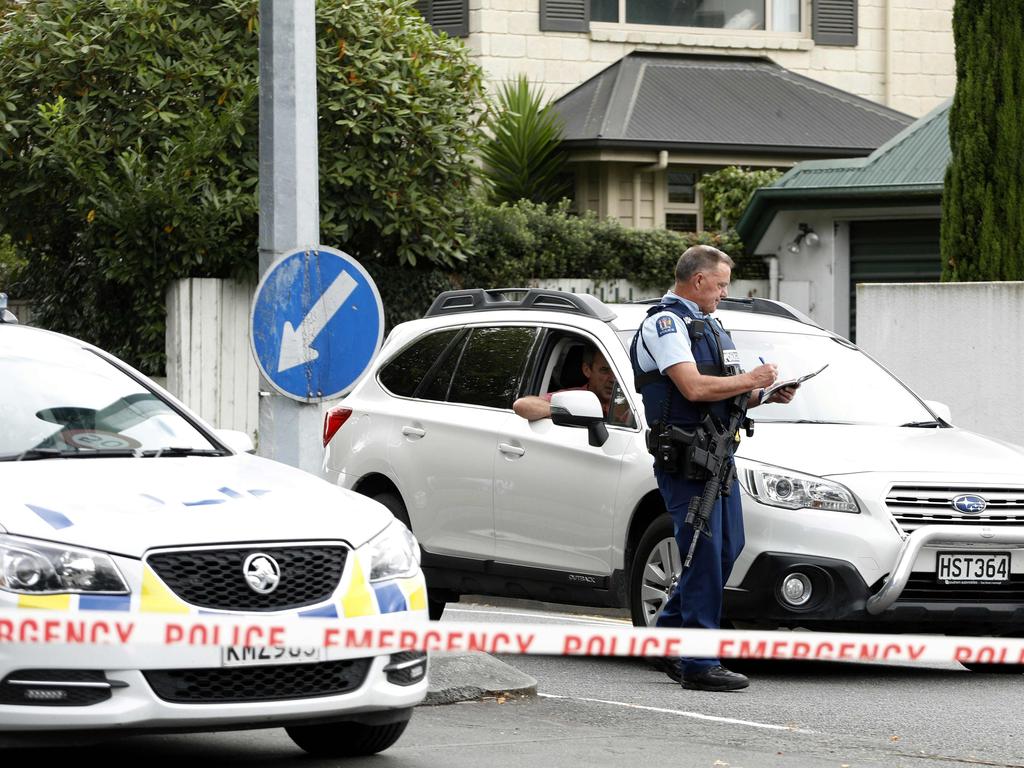 A police officer cordons off the area close to the Masjid al Noor mosque. Picture: AFP