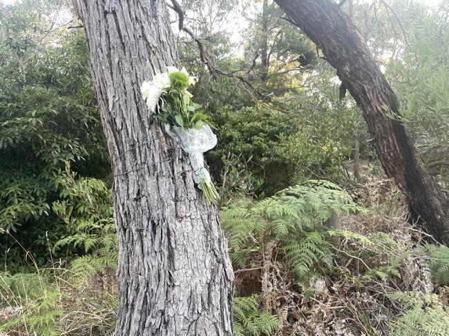 The flowers were tied to trees. Picture: Jack Colantuono