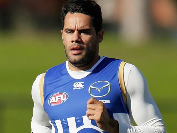 MELBOURNE, AUSTRALIA - JUNE 15: Daniel Wells takes part in running drills during a North Melbourne Kangaroos AFL training session at Arden Street Ground on June 15, 2016 in Melbourne, Australia. (Photo by Darrian Traynor/Getty Images)