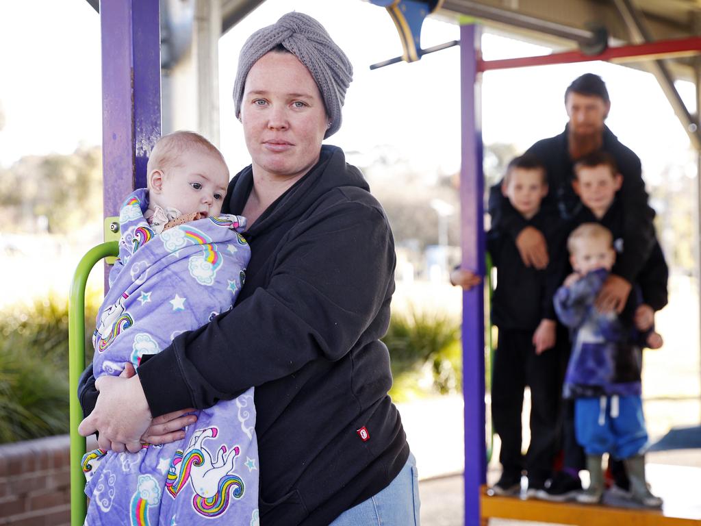 Laura Short with partner John Bell and kids Lane, Jax, Jasper and Paisley are living in motel room. Picture: Sam Ruttyn