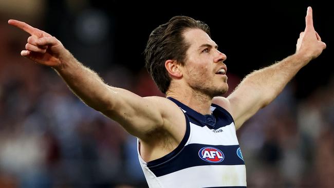 Isaac Smith celebrates a goal as the Cats steadied to get the job done against Port Adelaide. Picture: James Elsby/AFL Photos via Getty Images