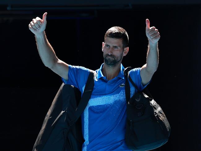 MELBOURNE, AUSTRALIA - JANUARY 24: Novak Djokovic of Serbia acknowledges the crowd as he leaves the court after retiring from the Men's Singles Semifinal against Alexander Zverev of Germany during day 13 of the 2025 Australian Open at Melbourne Park on January 24, 2025 in Melbourne, Australia. (Photo by Darrian Traynor/Getty Images)