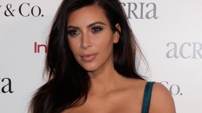 NEW YORK, NY - DECEMBER 10: Kim Kardashian attends the 19th Annual ACRIA Holiday Dinner at Skylight Modern on December 10, 2014 in New York City. (Photo by Thos Robinson/Getty Images for ACRIA)