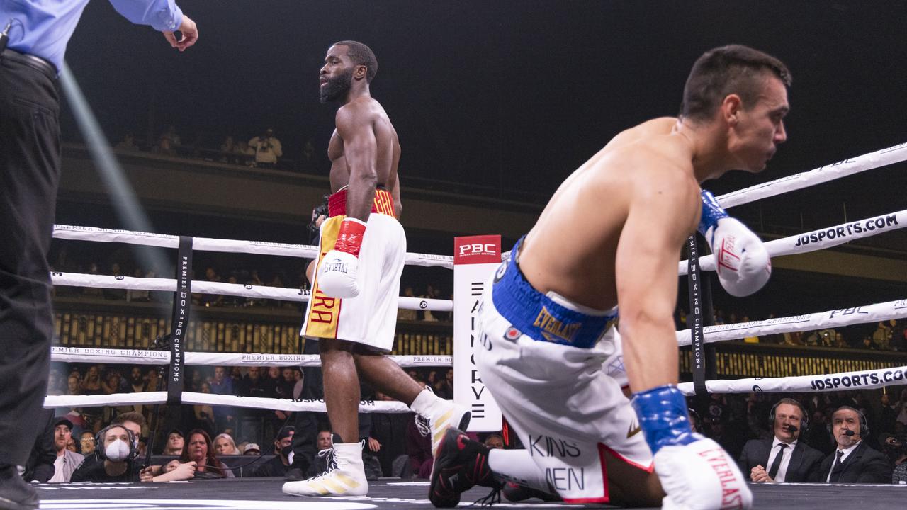 Tim Tszyu hits the canvas in the opening round. Picture: Esther Lin/SHOWTIME