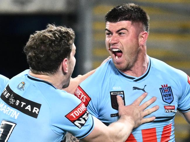 Bradman Best of the Blues celebrates after scoring a try during Game 3 of the 2023 State of Origin series between the New South Wales Blues and the Queensland Maroons at Accor Stadium in Sydney, Wednesday, July 12, 2023. (AAP Image/Dan Himbrechts) NO ARCHIVING, EDITORIAL USE ONLY