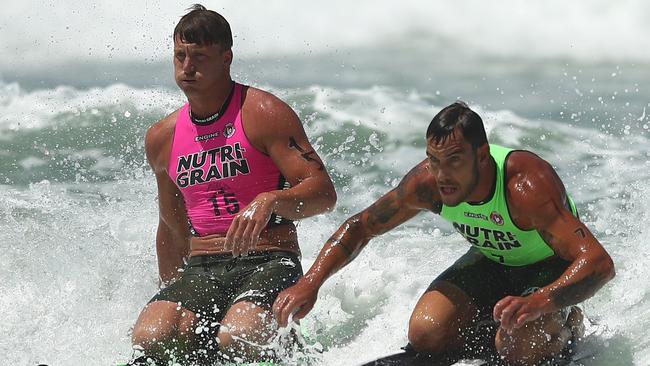 Ben Carberry and Matt Poole racing to the finish of the ironman on Sunday.