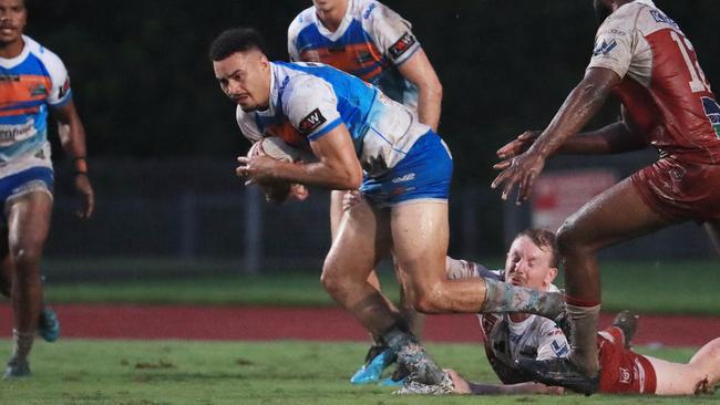 Robert Derby breaks through a tackle. Picture: Brendan Radke