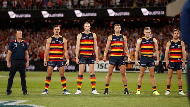 The Crows in staredown mode during the national anthem against Geelong. Picture: Michael Willson/AFL Media/Getty