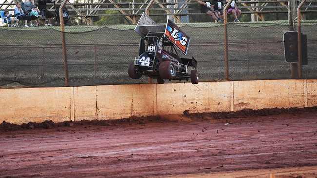 Maryborough Speedway Round One - Ken Newton climbs the wall after losing control on the slippery track. Picture: Cody Fox