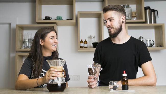 Seven Miles asset manager Carina Parlas with Sam McLoughin, part of Seven Miles’ coffee science education centre. Picture: Dylan Robinson