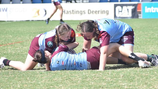 CQ Capras women go through their paces in a trial match against the clubâ€™s under-19s at Browne Park on Saturday, February 12, 2022.