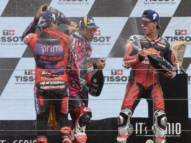 LAGOA, ALGARVE, PORTUGAL - MARCH 24: (L-R) Jorge Martin (first) of Spain and Prima Pramac Racing,  Enea Bastianini of Italy and Ducati Lenovo Team, Pedro Acosta (Third) of Spain and Red Bull GasGas Tech3 celebrate on the podium during the MotoGP race during the MotoGP Of Portugal - Race at Autodromo do Algarve on March 24, 2024 in Lagoa, Algarve, Portugal. (Photo by Mirco Lazzari gp/Getty Images)