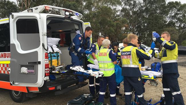 CareFlight medical staff and paramedics provided treatment to a six-year-old girl who was hit by a van in southwest Sydney yesterday. (AAP Image/CareFlight)